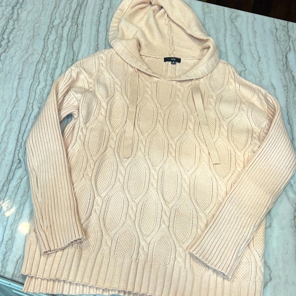 New never worn hooded sweater with venting on sides